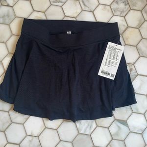 Brand new Lululemon swiftly tech tennis skirt, size 10 black